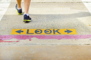 Santa Rosa pedestrian crosswalk injury attorney - person walking in a pedestrian crosswalk
